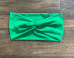 Load image into Gallery viewer, Kelly green turban headband,  green knotted headband, green baby turban headband, wide headband, solid yoga headband, top knot headband
